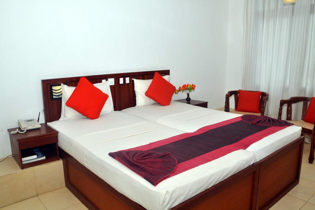 Hotel Lanka Super Corals Хіккадува Номер фото